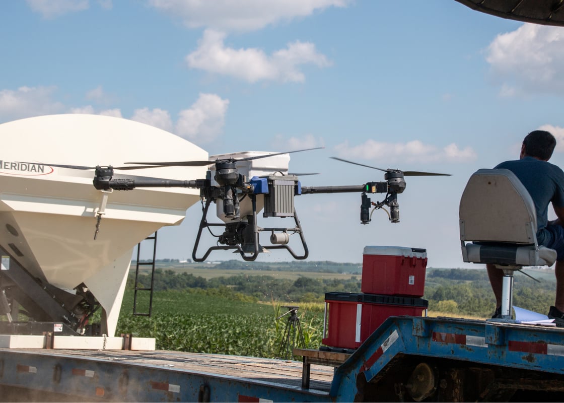 Drone filled with seed on a trailer